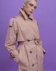PEACH TRENCHCOAT WITH DECORATIVE BELTS