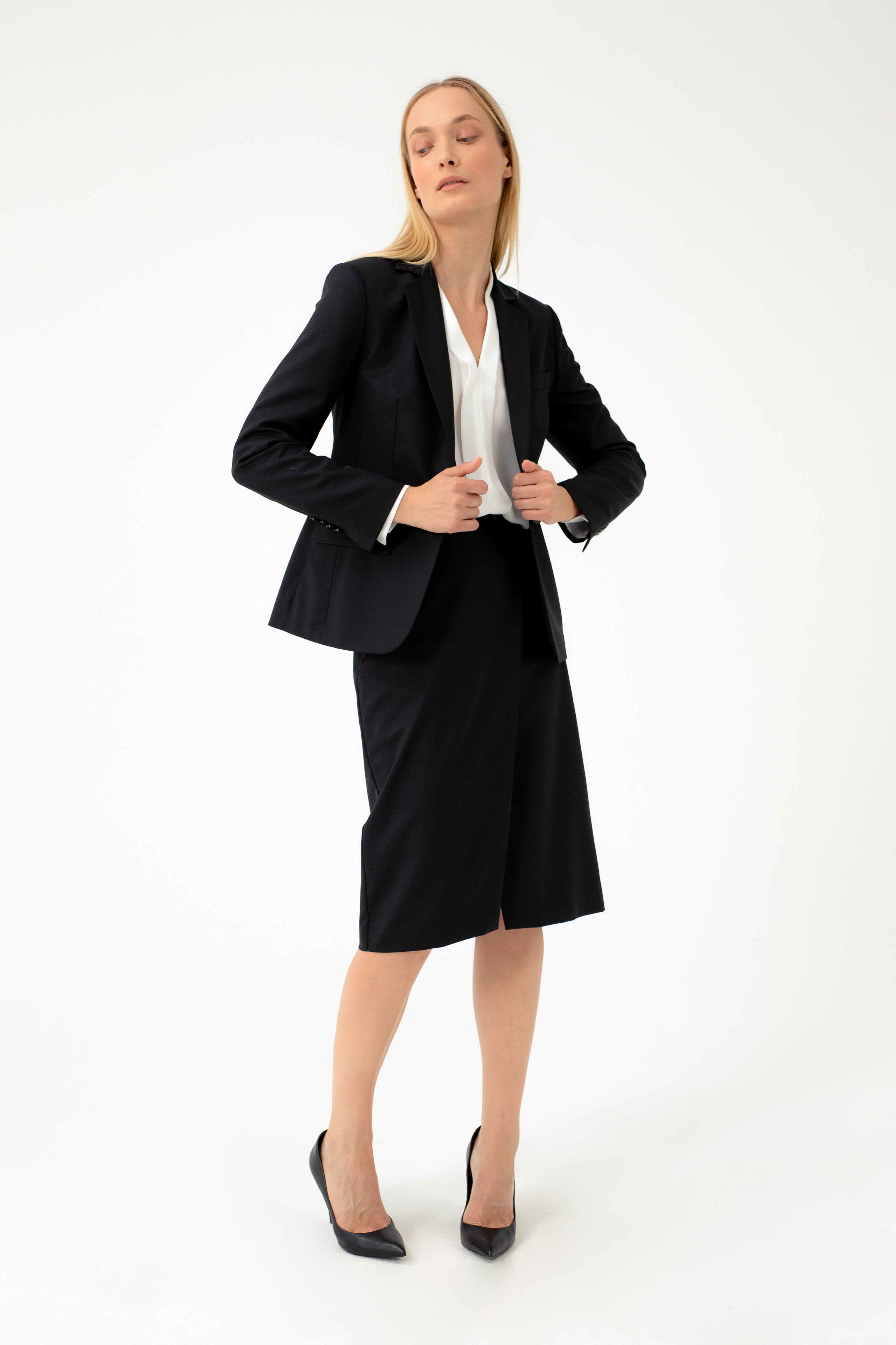 BLACK SUIT SKIRT WITH DIAGONAL SPLIT