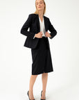 BLACK SUIT SKIRT WITH DIAGONAL SPLIT