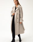 BEIGE TRENCHCOAT WITH DECORATIVE BELTS