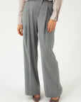 STRIPED WIDE-LEG TROUSERS WITH ASYMMETRIC CLASP