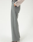 STRIPED WIDE-LEG TROUSERS WITH ASYMMETRIC CLASP