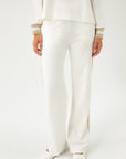 JERSEY WHITE PANTS WITH GOLDEN DETAILS