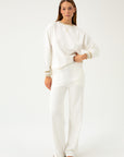 JERSEY WHITE PANTS WITH GOLDEN DETAILS